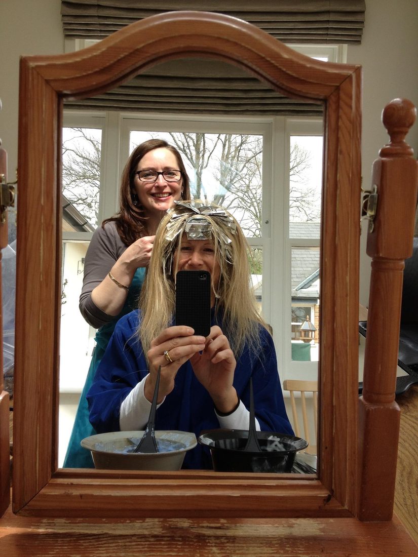 Angela at work, styling a client's hair at home